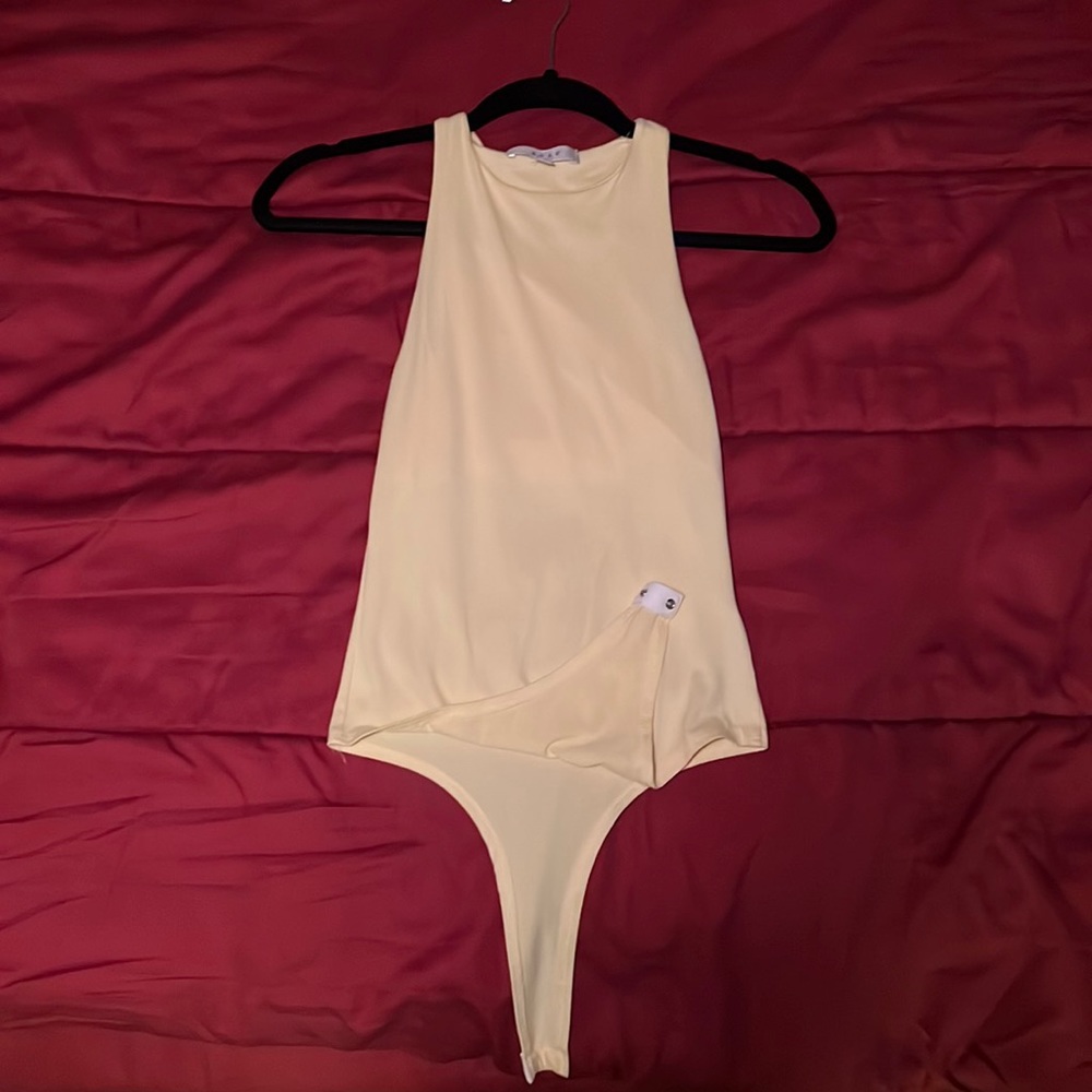 Yellow body suit